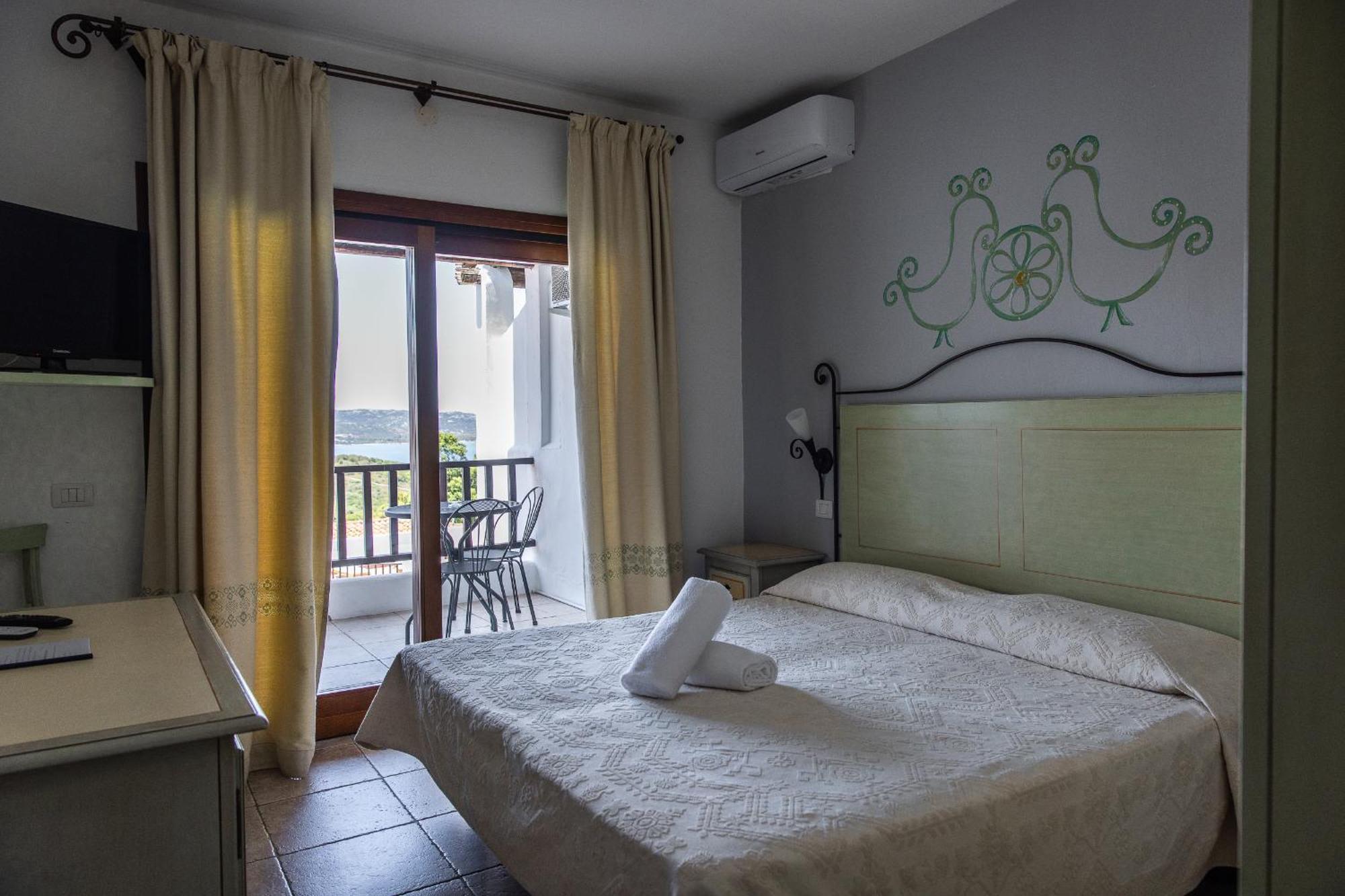 Hotel Pedra Santa Baja Sardinia Extérieur photo